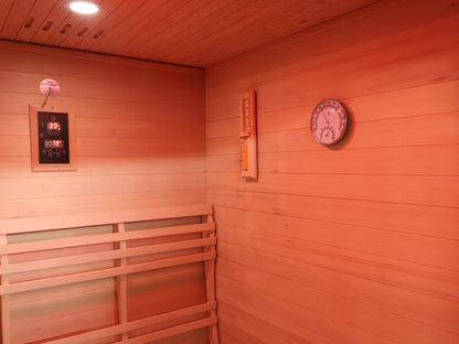 Corner inside the SunRay Freeport with the control panel, sand timer, hygrometer and backrest (interior shared with the Waverly)