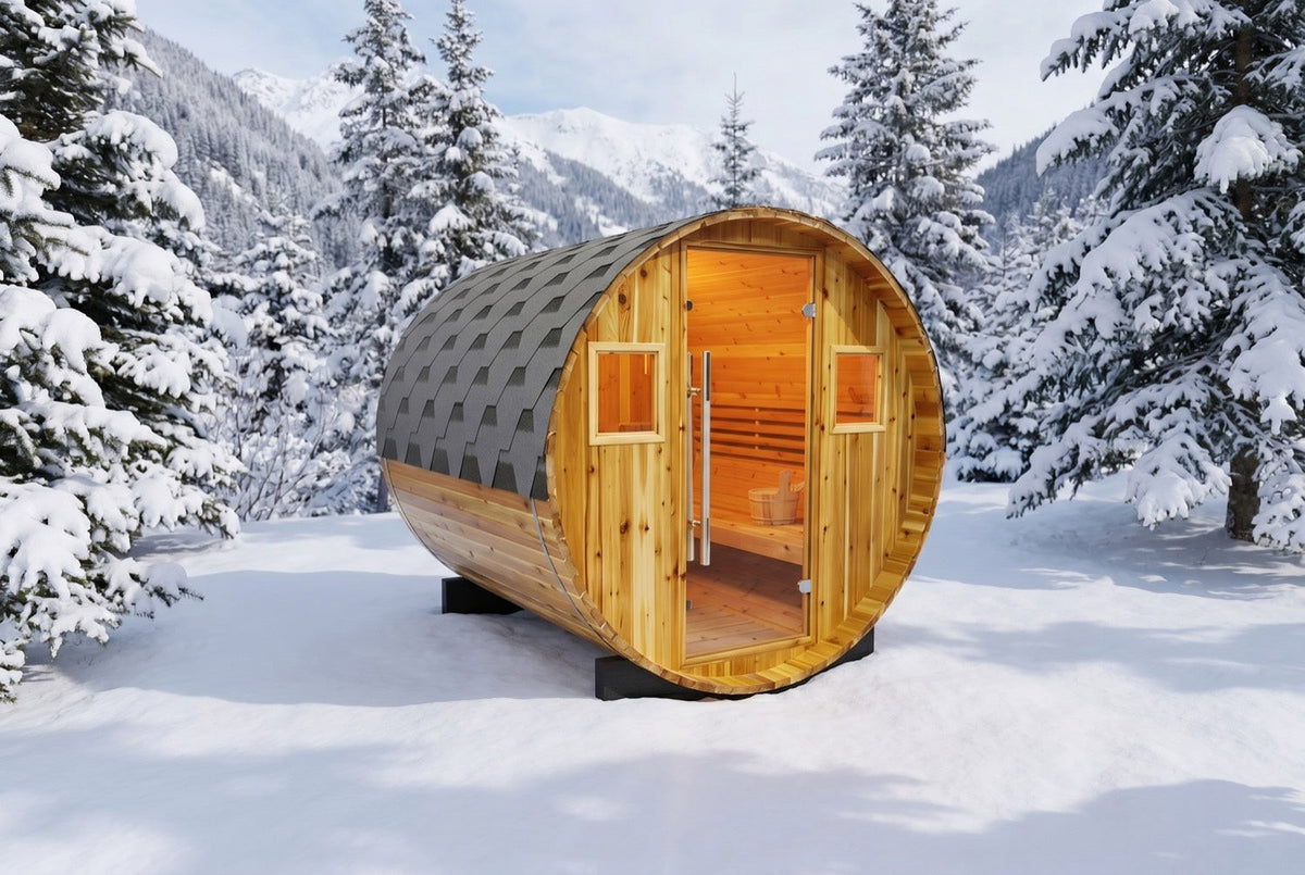 SunRay Galley barrel sauna in western red cedar in deep snow among snow-covered pines: glass door between two small windows under the shingled roof