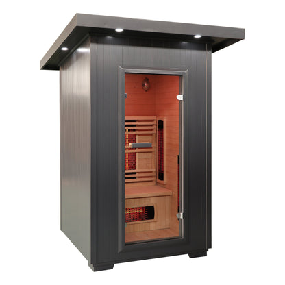 SunRay Logan 2-person outdoor infrared sauna, three-quarter view of the charcoal exterior with flat roof, roof-edge lights and glass door, hemlock interior, on a white background