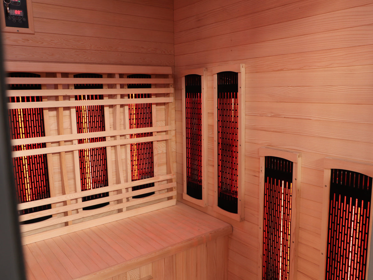Opposite corner of the SunRay Pacific interior, with the control panel, back wall heater panels and side wall panels