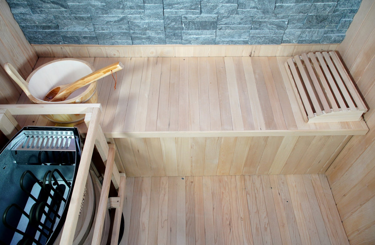 Looking down on the bench, headrest and bucket inside the SunRay Rockledge, heater in the foreground
