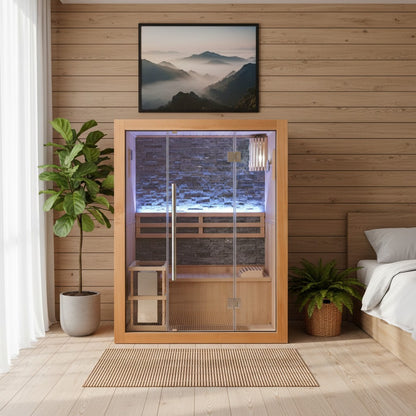 SunRay Rockledge indoor sauna in a bedroom under a framed mountain print, lit stone back wall behind the glass
