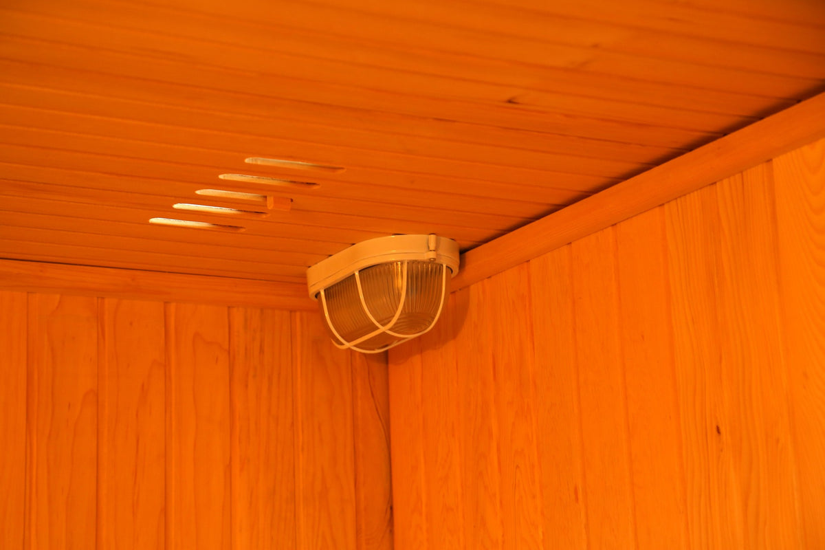 Caged ceiling light and ceiling vent slots inside the SunRay Southport