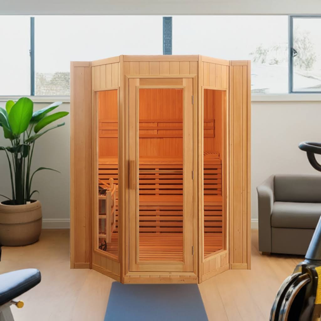 SunRay Tiburon indoor sauna in a home gym, angled glass front with the two-tier benches visible inside