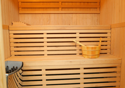 Two-tier benches inside the SunRay Tiburon, bucket and ladle on the upper bench and the heater at the lower left