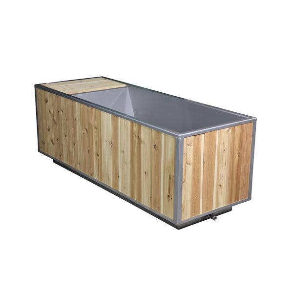 The Flow Cold Plunge on white viewed from the rear corner, open stainless steel tub with cedar top step