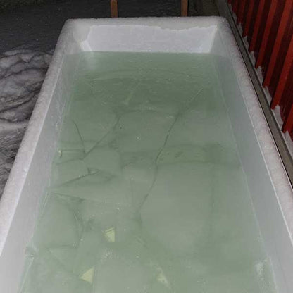 The Polar Plunge Tub with the white HDPE plastic interior, the standard build, filled with water and ice