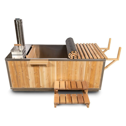The Starlight hot tub from the side, shown with the optional aluminum interior, cedar roll-up cover and two tier step, chimney at the far end.