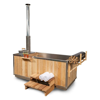 The Starlight hot tub from the stove end with its perforated chimney shield and firebox lid, shown with the optional drink shelf and step.