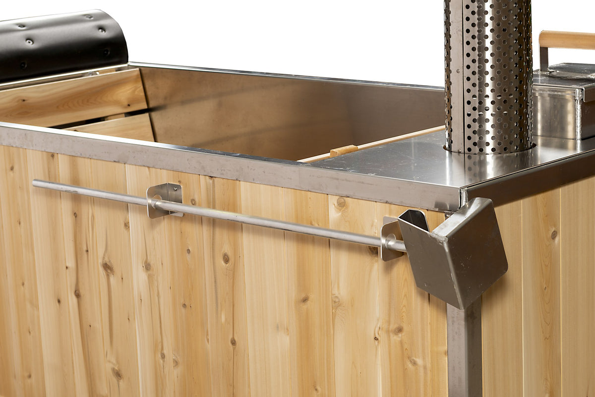 Close view of the Starlight stainless top rim, a slim stainless rail on brackets, and the vertical cedar skirt boards below it.