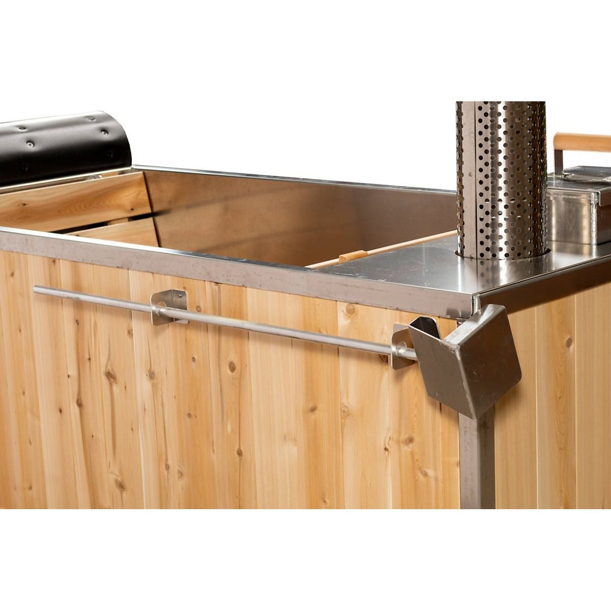 Close view of the Starlight stainless top rim, a slim stainless rail on brackets, and the vertical cedar skirt boards below it.
