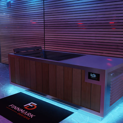 Finnmark SoulCold plunge tub lit at night, showing the touchscreen on the cabinet end