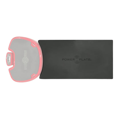 Power Plate Deluxe Support Cushion from above, concave end matching the contour of a Power Plate MOVE